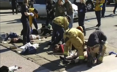 Rescue crews tend to the injured in the intersection outside the Inland Regional Center in San Bernardino, California in this still image taken from video December 2, 2015. At least 20 people were reported injured in an active shooter situation, according to news reports. REUTERS/NBCLA.com/Handout via Reuters NO SALES. FOR EDITORIAL USE ONLY. NOT FOR SALE FOR MARKETING OR ADVERTISING CAMPAIGNS. THIS IMAGE HAS BEEN SUPPLIED BY A THIRD PARTY. IT IS DISTRIBUTED, EXACTLY AS RECEIVED BY REUTERS, AS A SERVICE TO CLIENTS NO RESALES. NO ARCHIVE