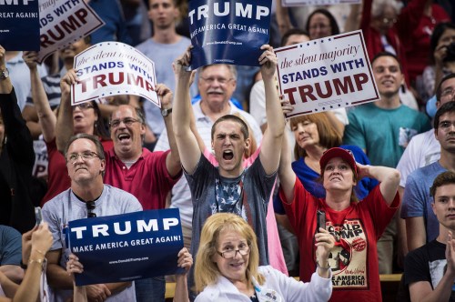 ORLANDO, FL - MARCH 5: Supporters cheer as republican presidential candidate Donald Trump speaks during a campaign event at the CFE Federal Credit Union Arena in Orlando, FL on Saturday March 05, 2016. (Photo by Jabin Botsford/The Washington Post via Getty Images)